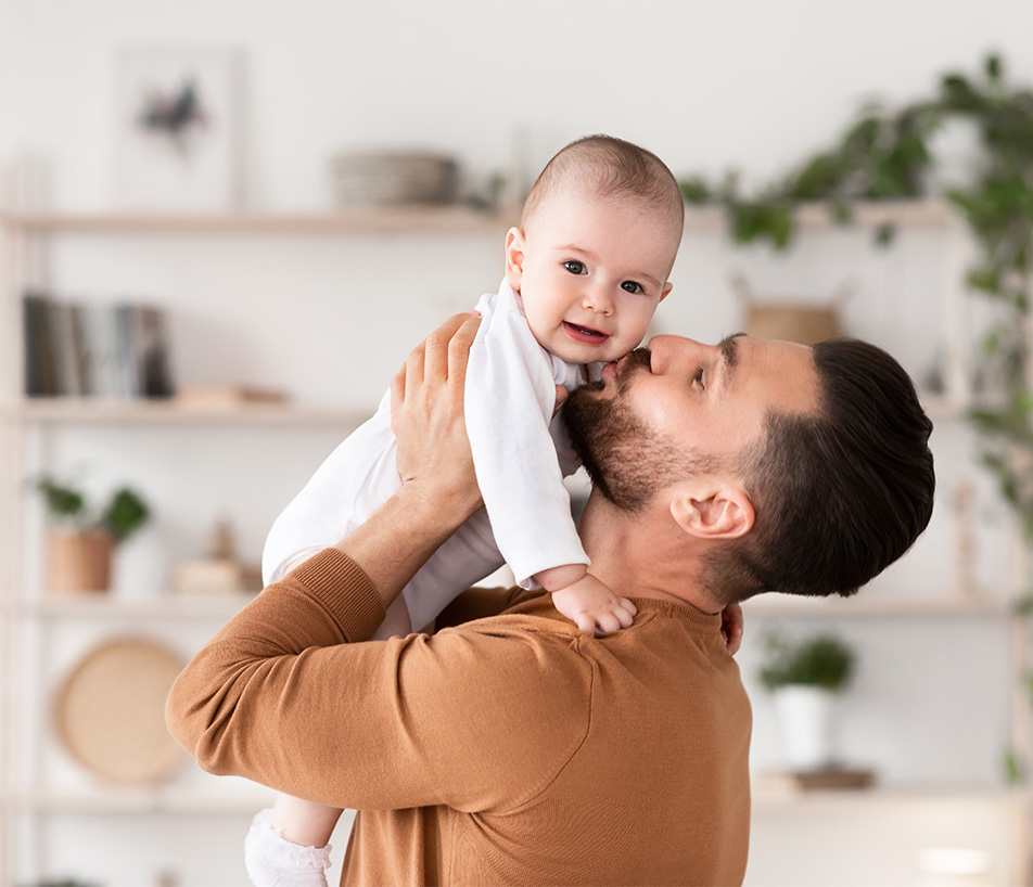 Little boy and his father hugging